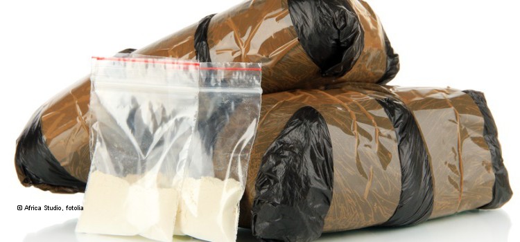 Packages of narcotics isolated on white