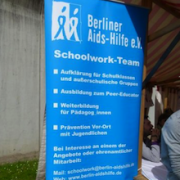 Plakat des Aidshilfe-Schollworkteams