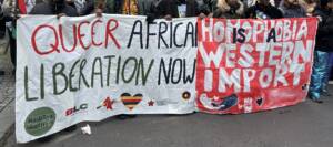 protest banners "Homophobia is a Western Import" und "Queer African Liberation Now"